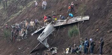 موقع سقوط إحدى الطائرات في إندونيسيا