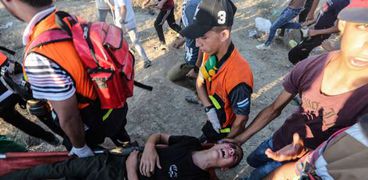 إصابة 14 فلسطينيا بنيران الاحتلال الإسرائيلي شرق قطاع غزة