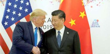 الرئيس الصيني في لقاء سابق مع نظيره الأمريكي دونالد ترامب