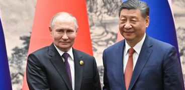 الرئيس الصيني والروسي خلال زيارة الأخير لبكين