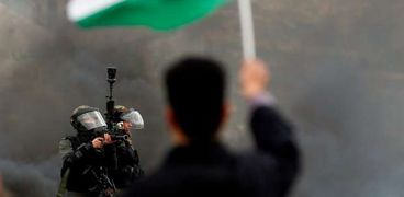 فلسطينيون يحيون اليوم الوطني لاسترداد جثامين الشهداء