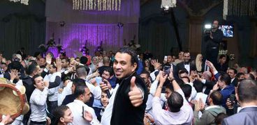 بالصور| الليثي يشعل حفل زفاف أحمد فودة ورضوى الشناوي