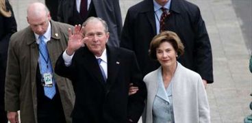 بالصور| وصول جورج بوش وزوجته لـ"الكابيتول" لحضور مراسم تنصيب ترامب