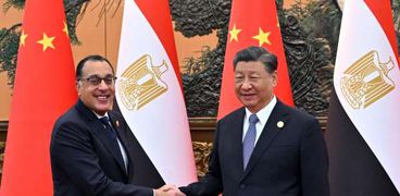الرئيس الصيني شي جين بينج مع الدكتور مصطفى مدبولي