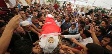 تشييع أحد قتلى "حادث السفارة" في الأردن وسط هتافات "الموت لإسرائيل"