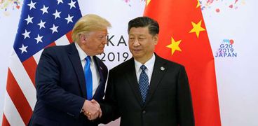 الرئيس الصيني شي جين بينغ ونظيره الأمريكي دونالد ترامب