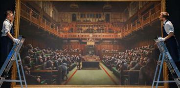 لوحة "البرلمان المتخلف" التي تجلس فيها قردة الشمبانزي