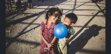 بالصور| ابتسامة الأطفال تتحدى ظروف المعيشة القاسية في بنجلاديش