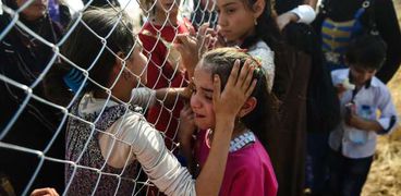 أطفال سوريون يعانون من جحيم الإرهاب فى المناطق المحاصرة