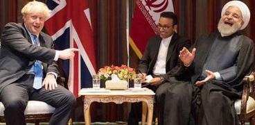 لقاء سابق بين رئيس الوزراء البريطاني والرئيس الإيراني