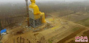 بالصور| الرأسماليون الصينيون يصنعون تمثالًا ذهبيا لـ"ماو تسي تونج" بتكلفة 3 ملايين يوان