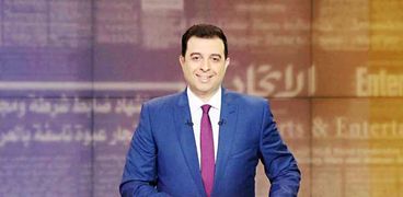 الإعلامي ياسر رشدي