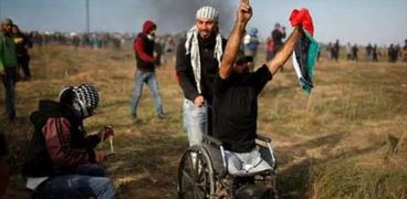 معاقيين فلسطينيين مشاركين بمسيرات العودة الكبرى