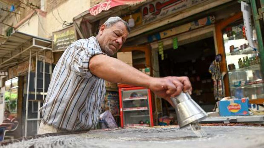 صورة «عم حودة» أقدم صنايعي «كنافة» في الإسكندرية: «أحب أخدم العجين» (صور) – رمضان 2021